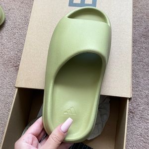 Yeezy slides , brand new, never worn, verified by goat.